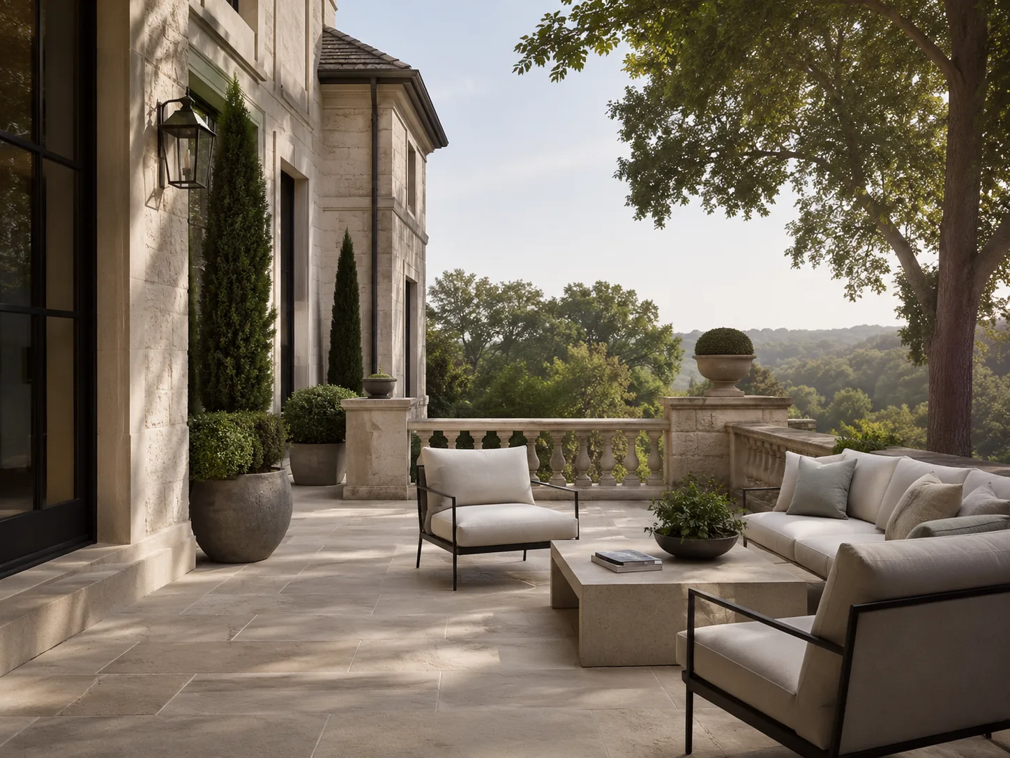 Residential stone-paver terrace with garden table